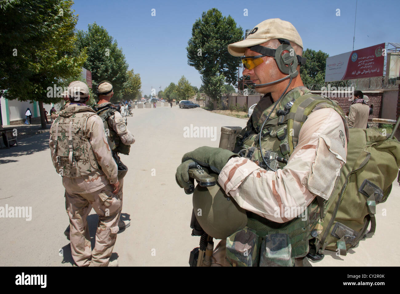 Dutch police mentors walking patrol with Afghan police officers in ...