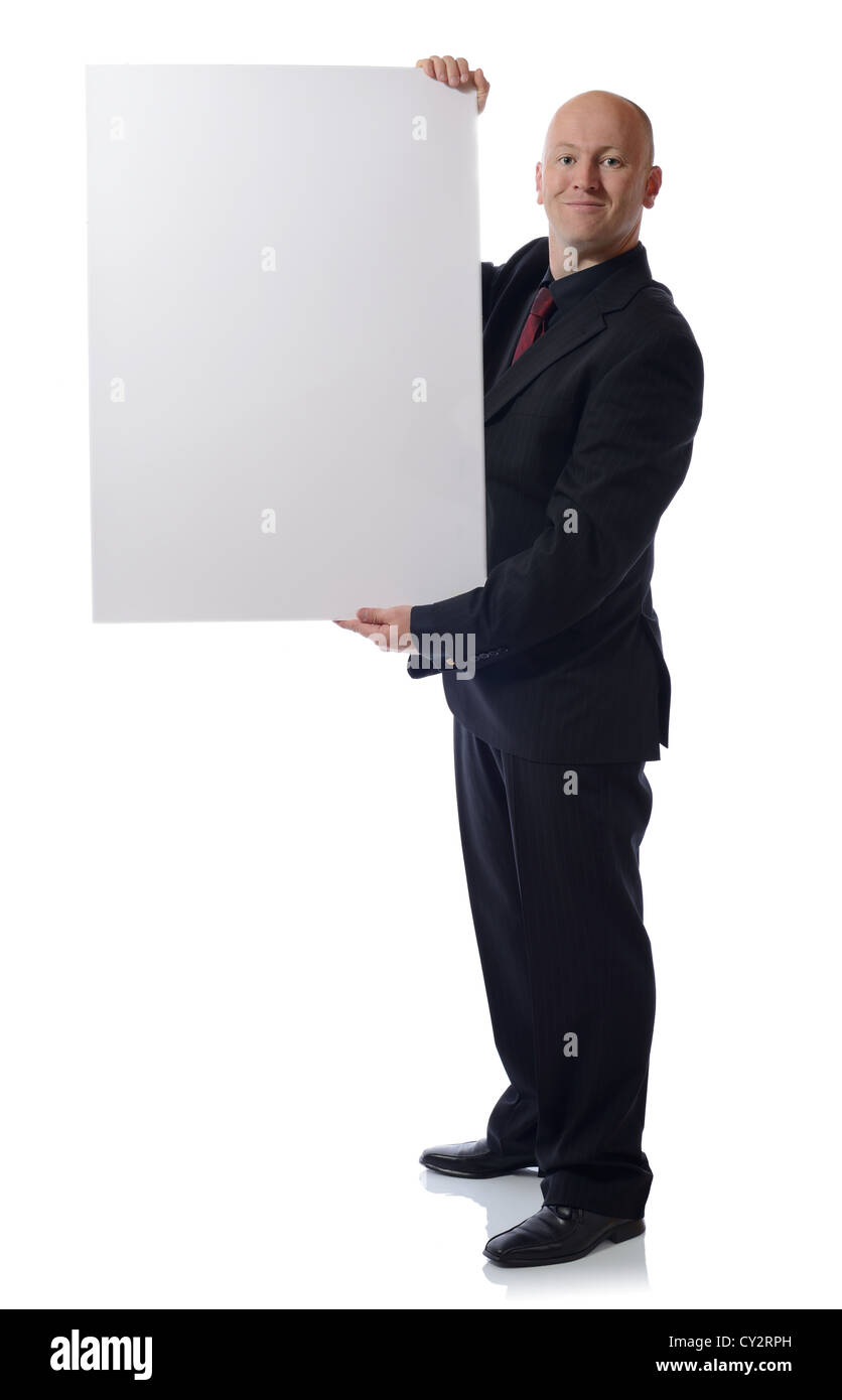 man in suit holding large card advert Stock Photo