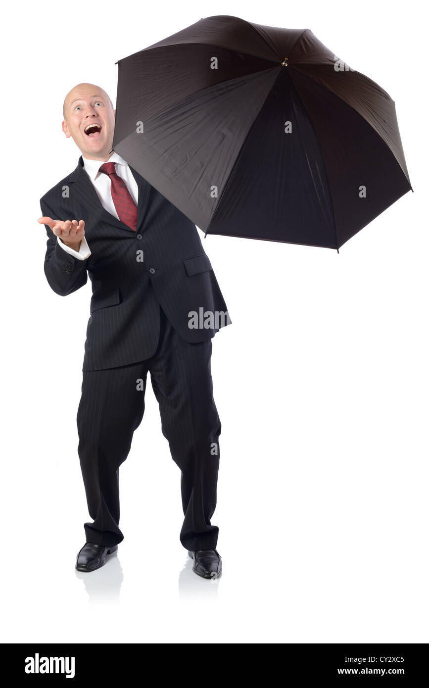 Man in suit with umbrella concept of getting better Stock Photo