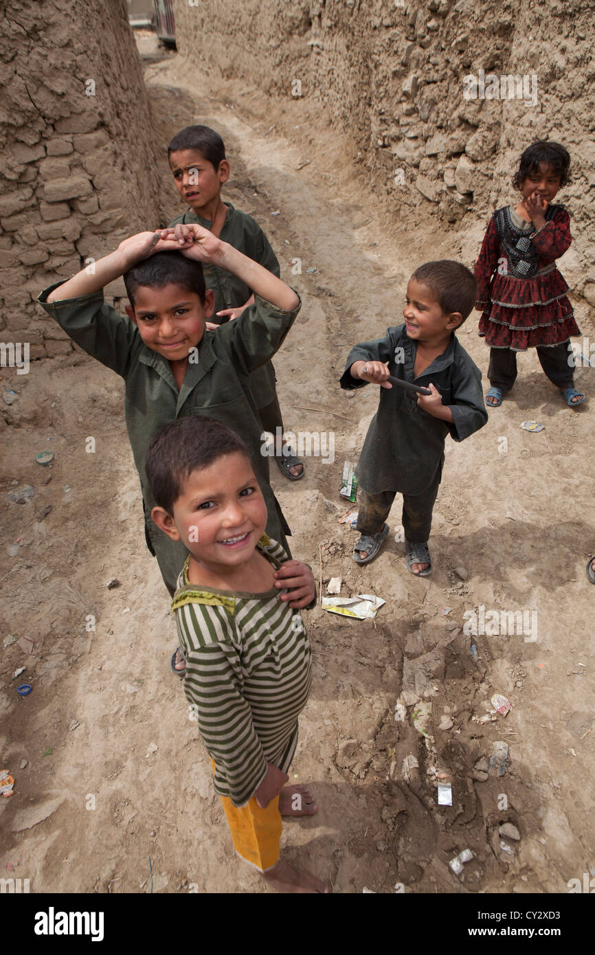 Afghan children playing in a slum in Kabul Stock Photo - Alamy