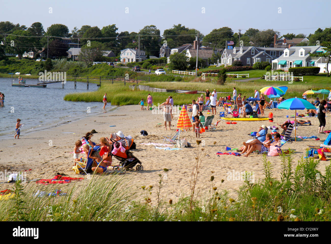 Massachusetts Cape Cod Chatham Oyster Pond Beach sunbathers family