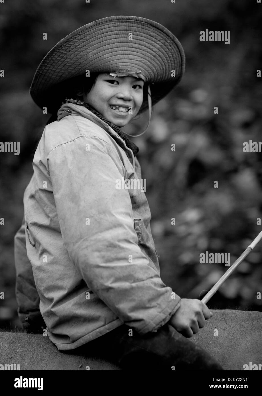 Smiling Boy Wearing A Big Hat, Sapa, Vietnam Stock Photo