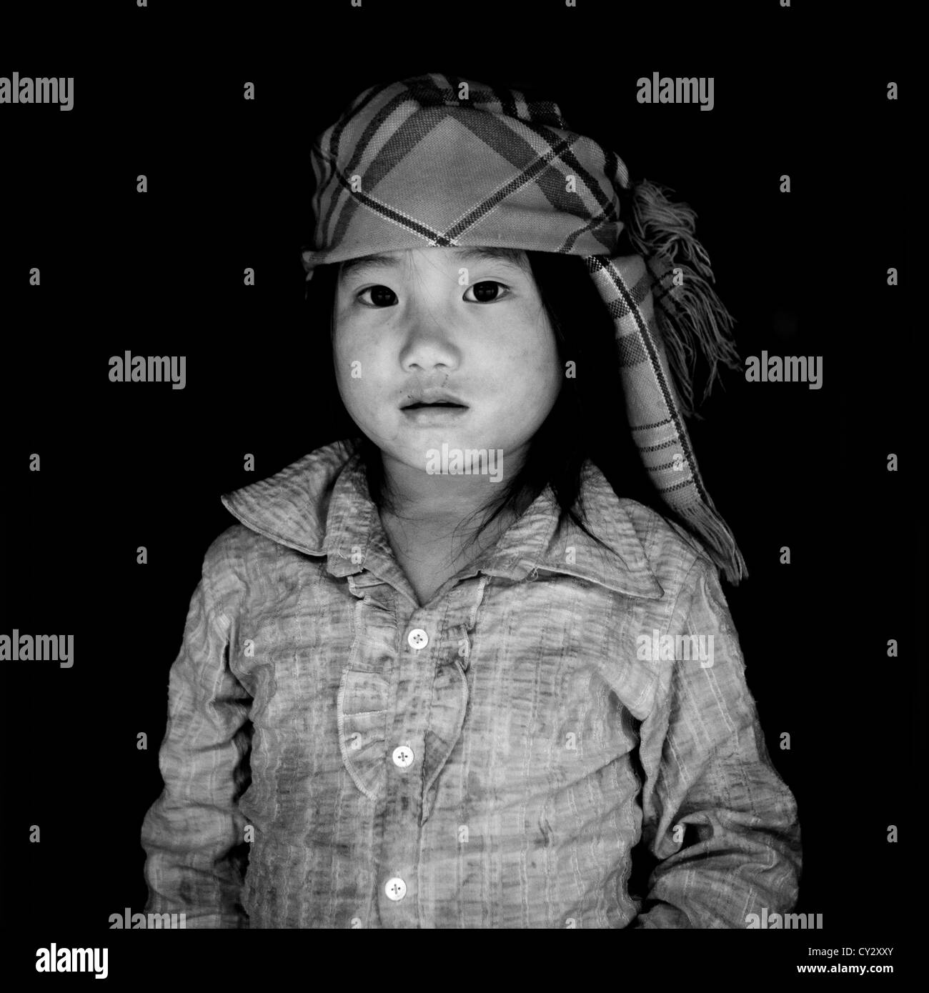Young Flower Hmong Girl With A Headscarf, Sapa, Vietnam Stock Photo