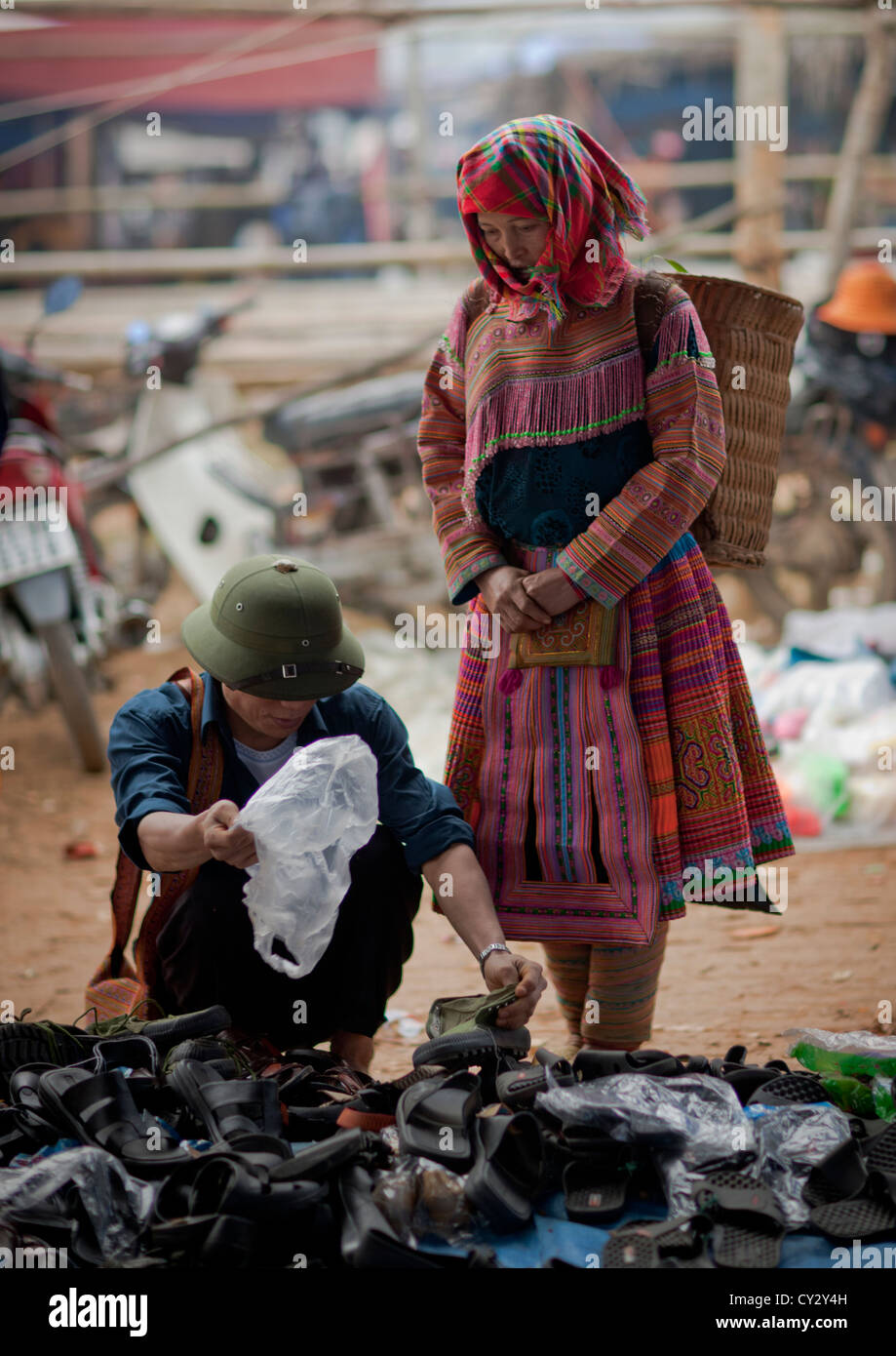 Flower Hmong Woman Looking For Shoes, Sapa Market, Vietnam Stock Photo