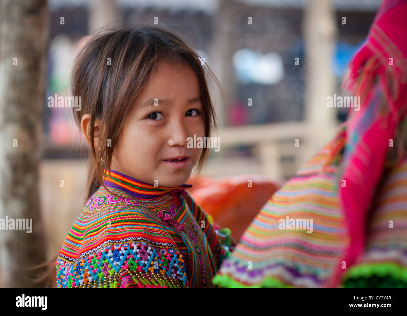Young Flower Hmong Girl At Sapa Market, Vietnam Stock Photo