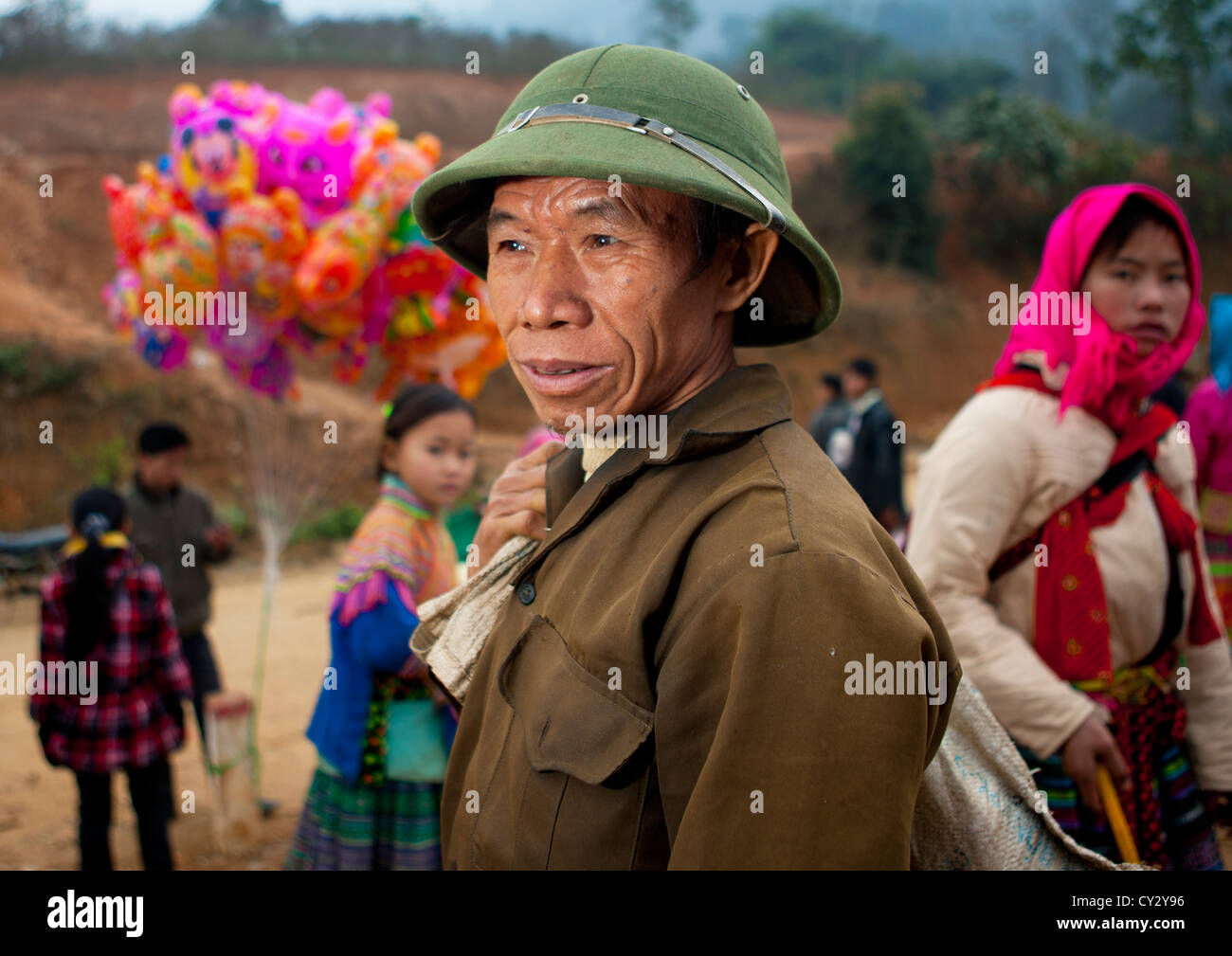 Man With A Colonial Hat On A Market Place, Sapa, Vietnam  Stock Photo