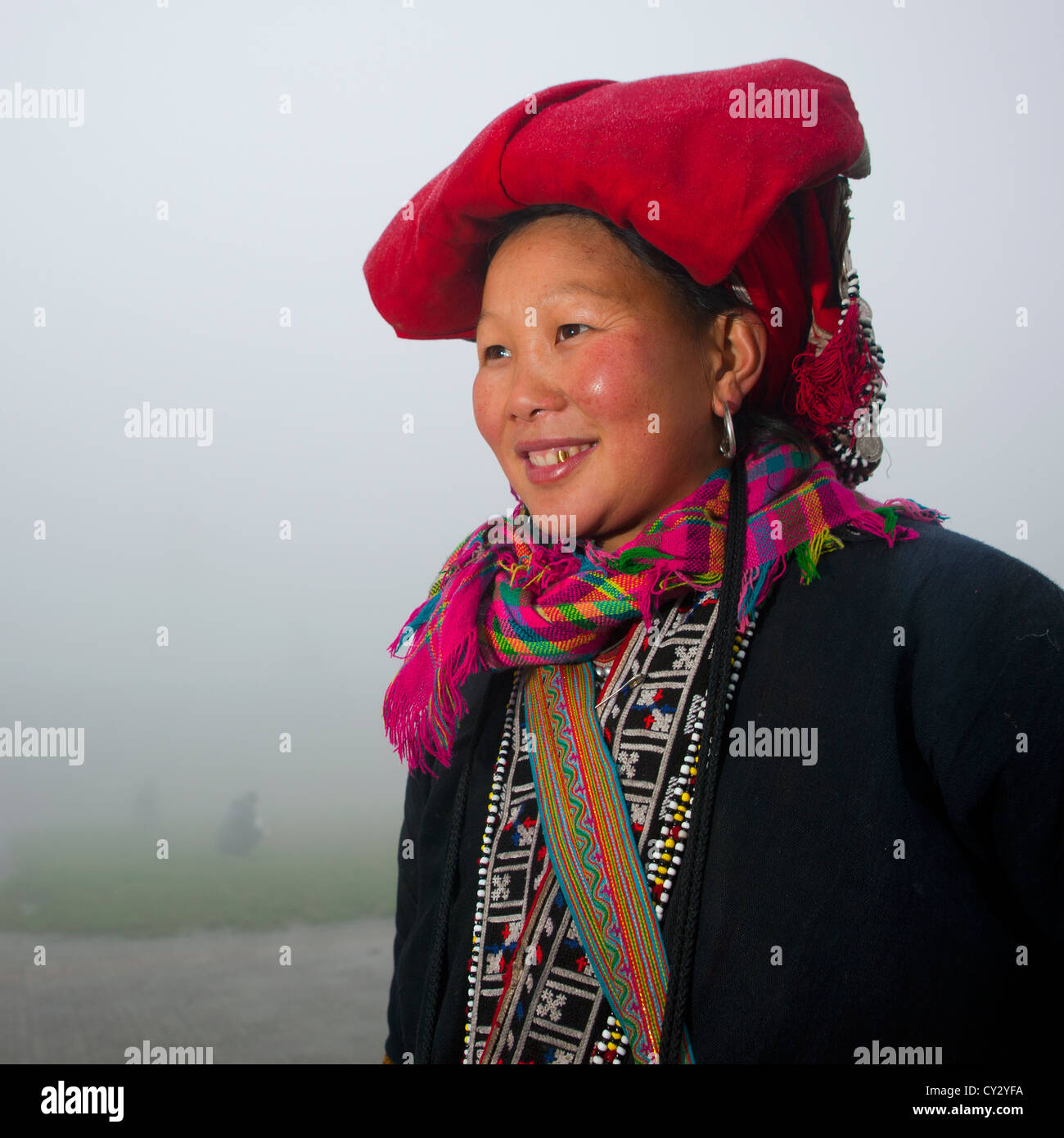 Smiling Red Dzao Woman With Traditional Headgear, Sapa, Vietnam Stock Photo