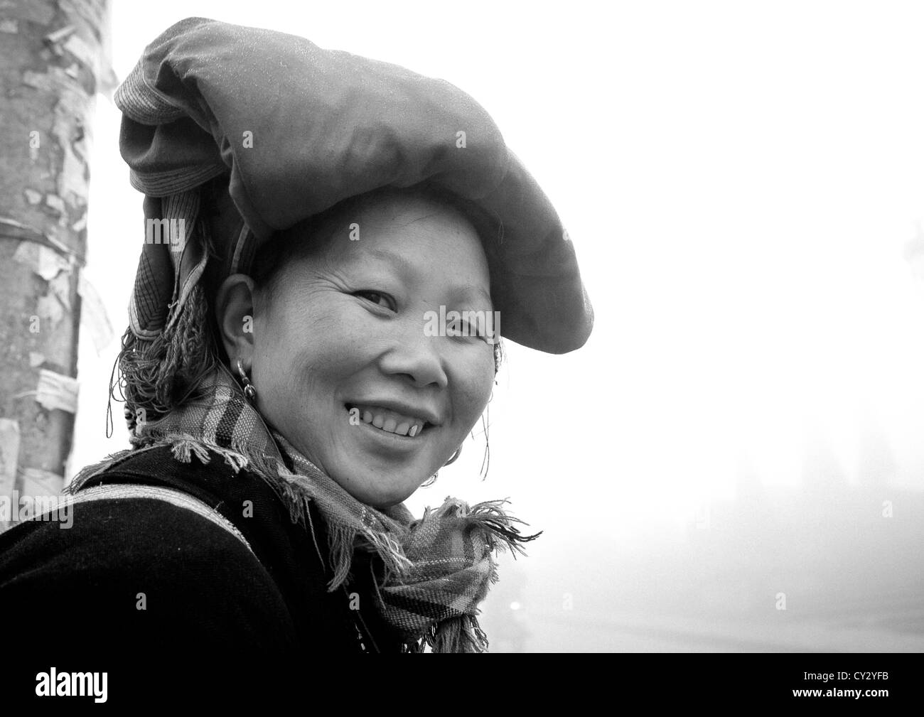 Smiling Red Dzao Woman With Traditional Headgear, Sapa, Vietnam Stock Photo