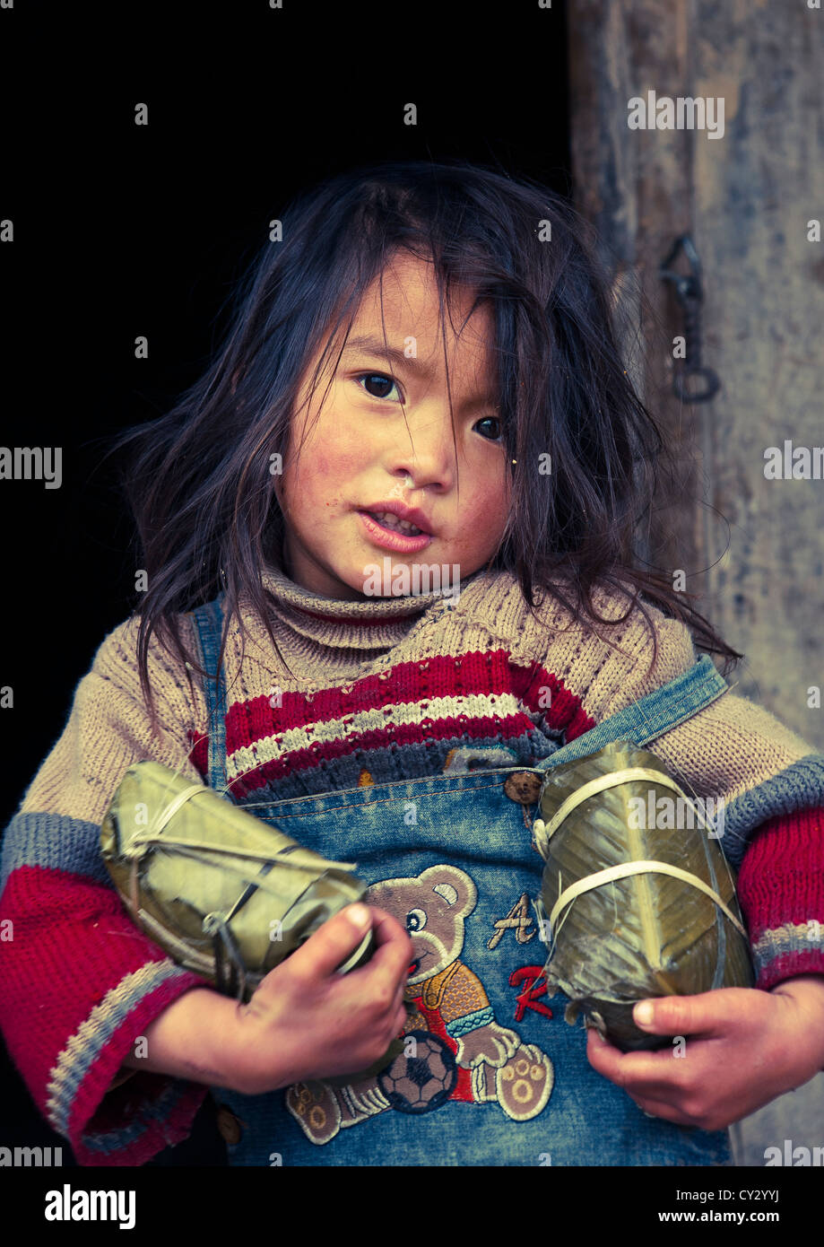 Hmong Wrapped Rice Black Hmong Girl Holding Holding Wrapped Rice Cakes For Tet, Sapa ...