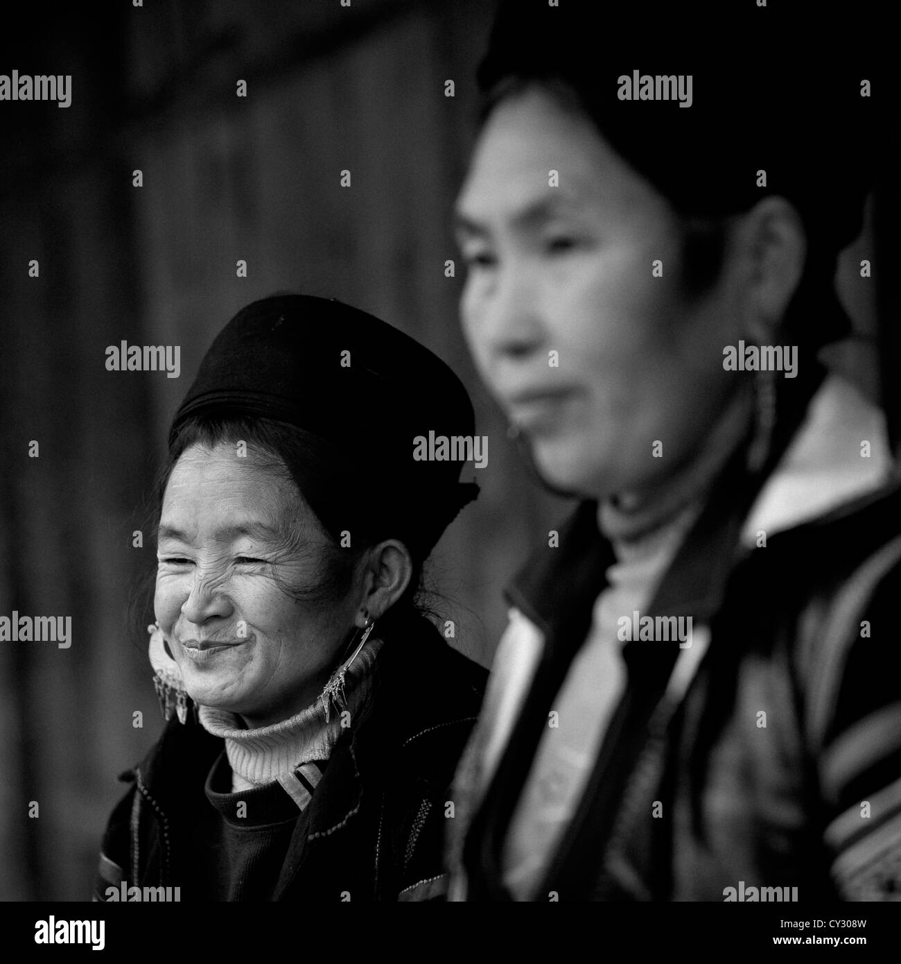 Black Hmong Women With Traditional Hat And Earrings, Sapa, Vietnam Stock Photo