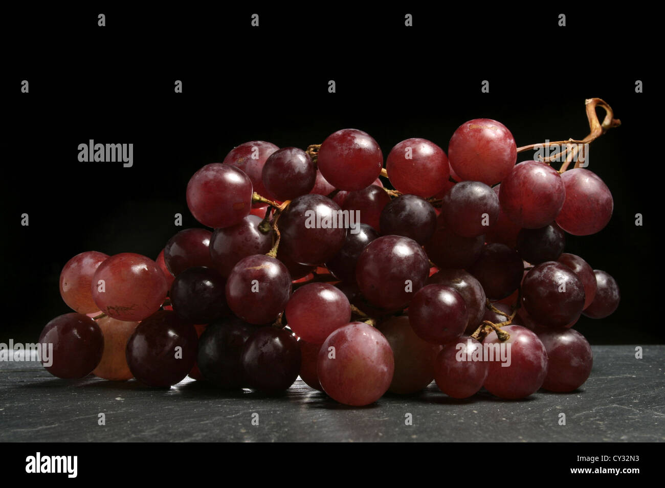 Picture Steve Race Spanish eating grapes, Catalunya, Spain Stock