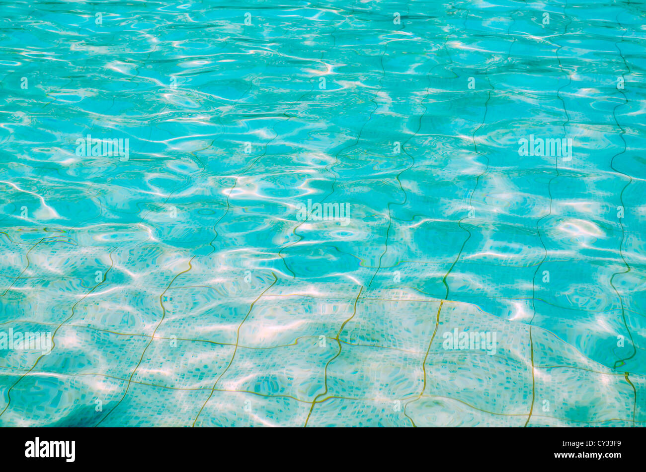 Ripples of clear, turquoise pool water Stock Photo - Alamy