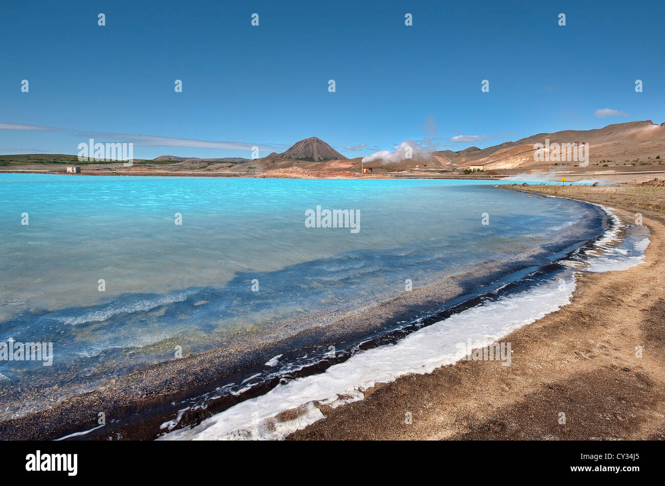 The bright blue hot spring waters around Lake Mývatn are provide geothermal energy for Iceland's national electricity grid. Stock Photo