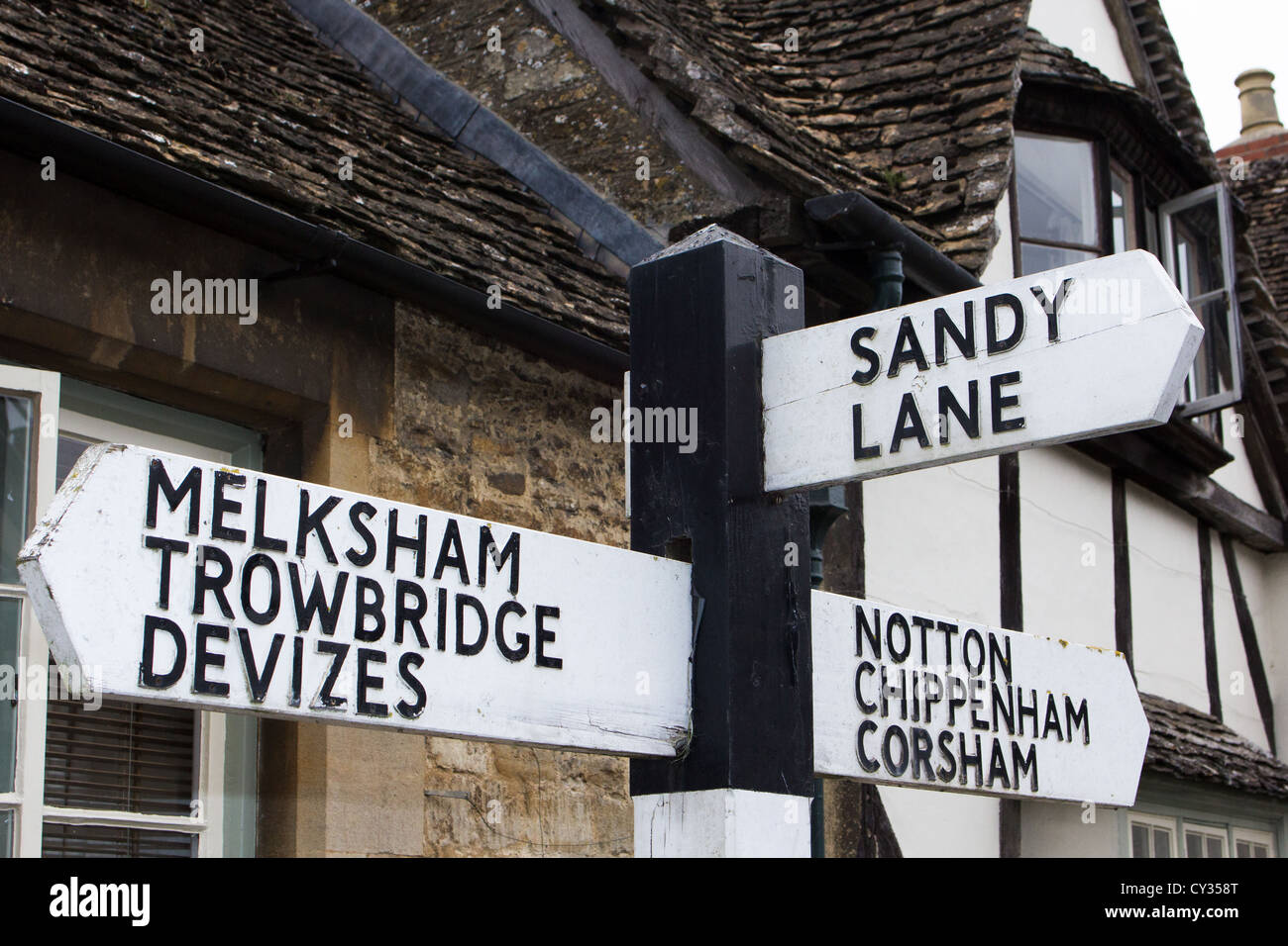 early old fashioned road traffic signs England UK Stock Photo