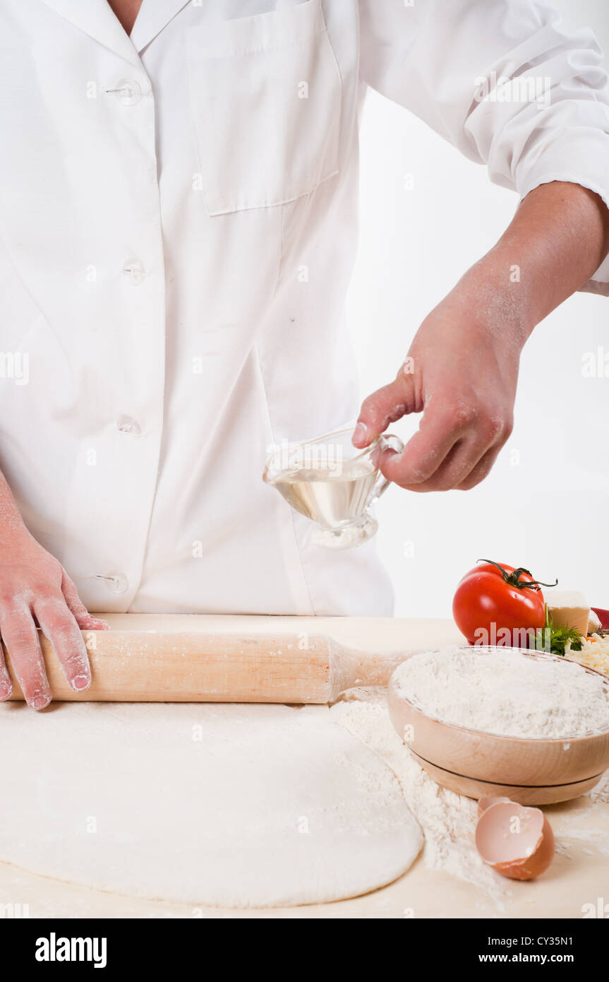 woman hands knead dough for pizza Stock Photo - Alamy