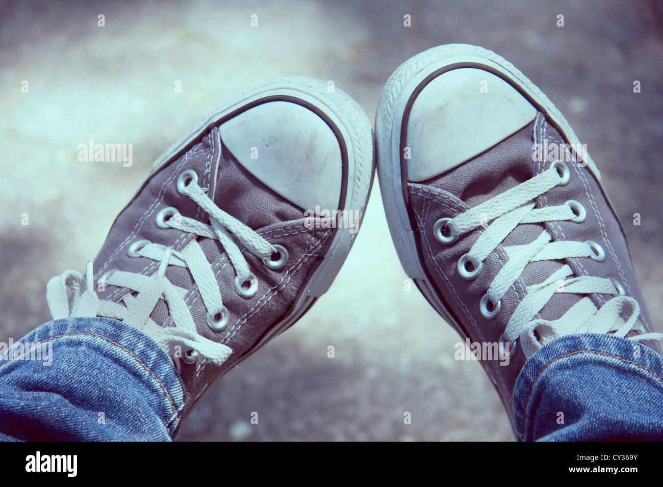 Relaxing with my converse Stock Photo - Alamy
