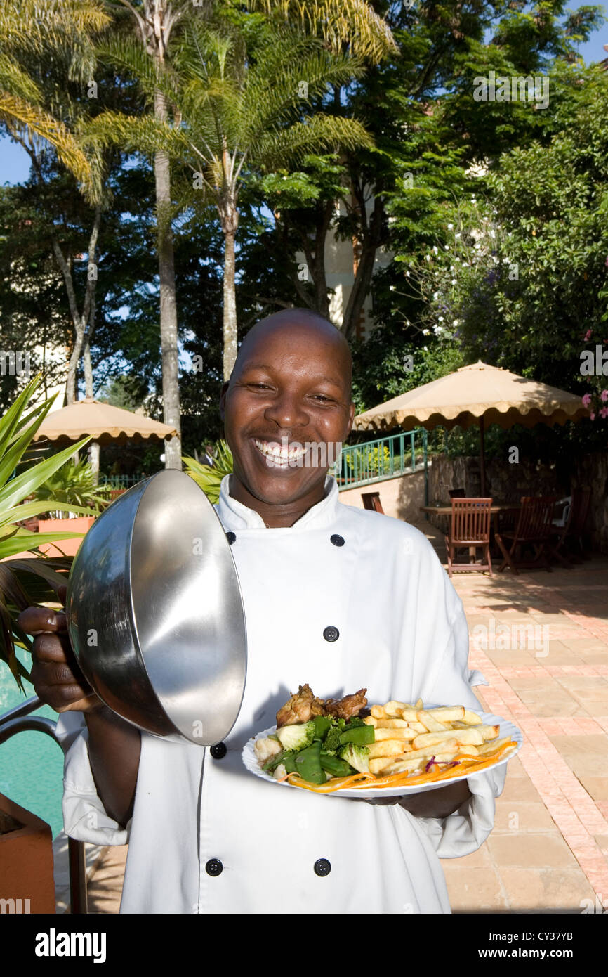 African waitress in Hotel, Kenya Stock Photo