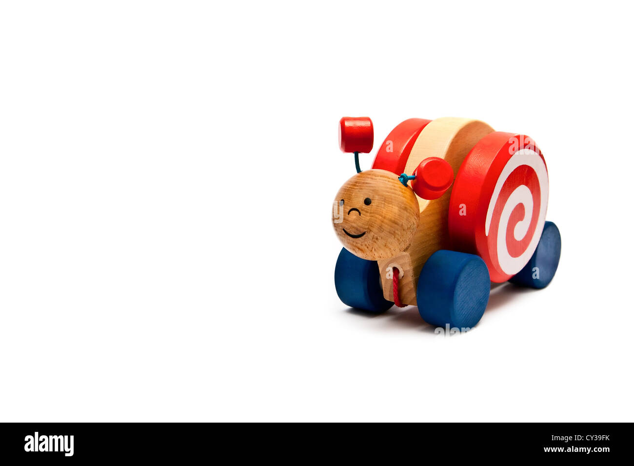 Children's toys - wooden snail on wheels with a rope Stock Photo