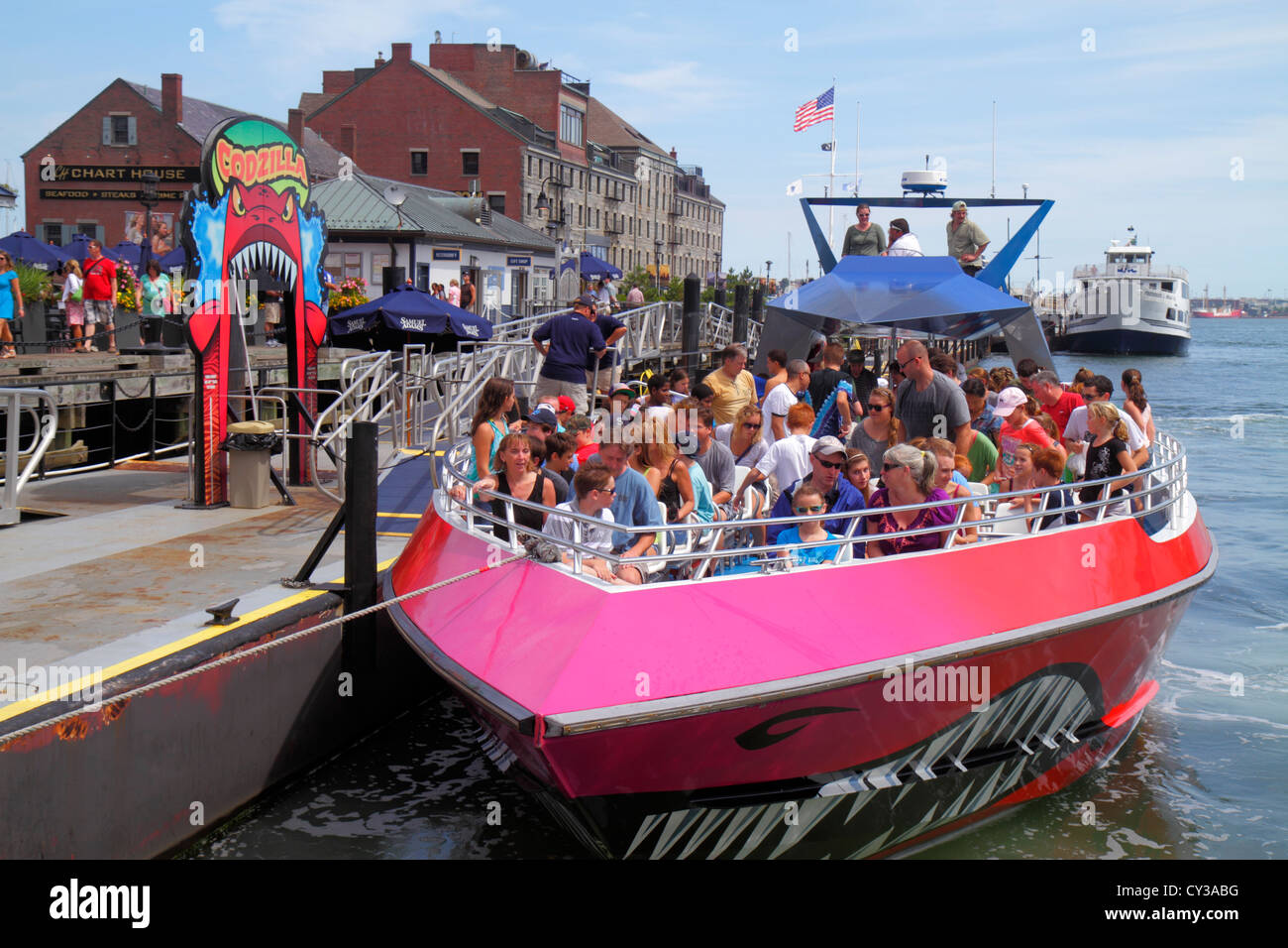 Boston Massachusetts,Long Wharf,harbor,harbour,Godzilla,speedboat ride,passenger passengers rider riders,MA120822020 Stock Photo