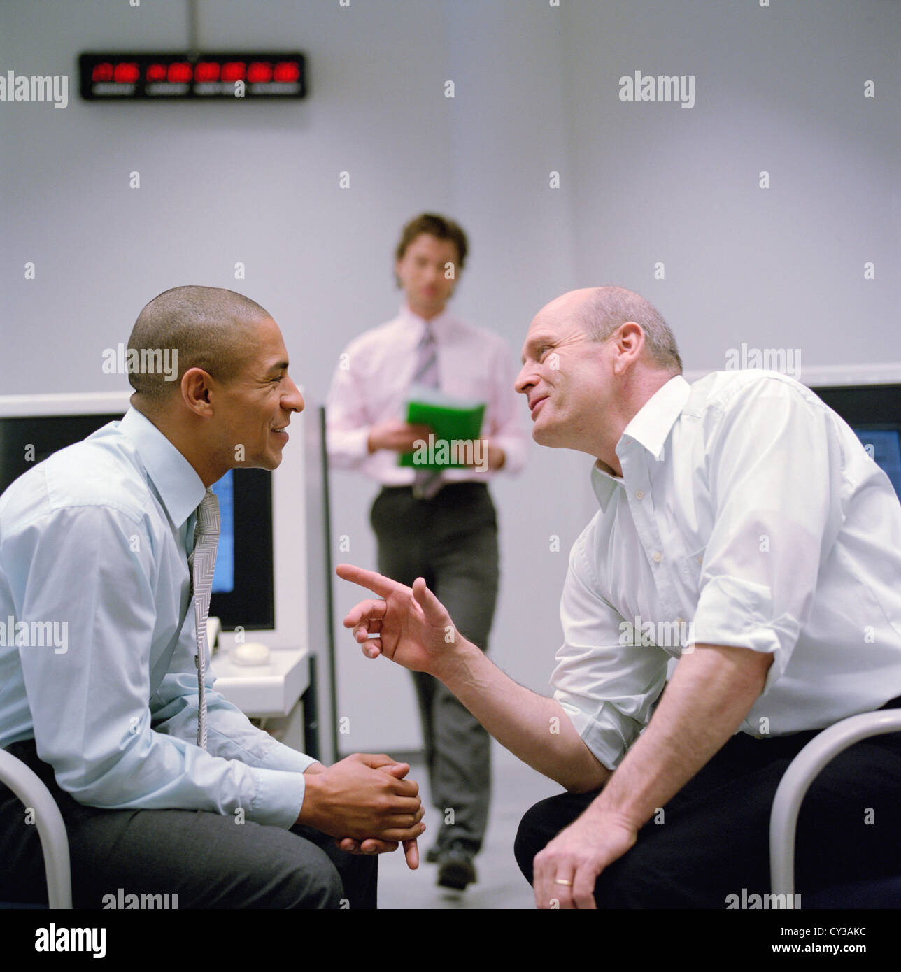 business people data center control center man License free except ads and outdoor billboards Stock Photo