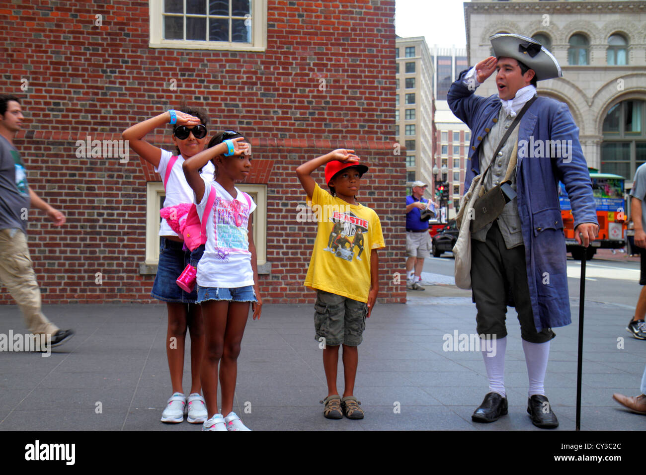 Boston Massachusetts,Washington Street,The Freedom Trail,Old State House,historic building,costumed re enactor,actor,man men male adult adults,patriot Stock Photo