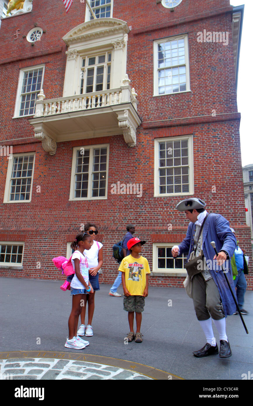 Boston Massachusetts,Washington Street,The Freedom Trail,Old State House,historic building,costumed re enactor,actor,man men male adult adults,patriot Stock Photo