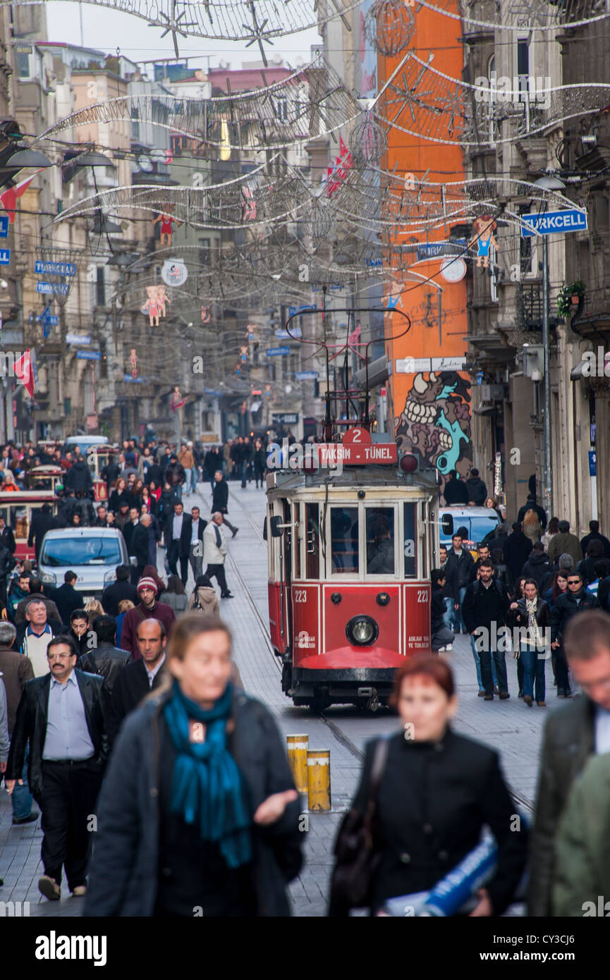 A vintage tram on the shopping street Istiklal Caddesi in modern Istanbul Stock Photo