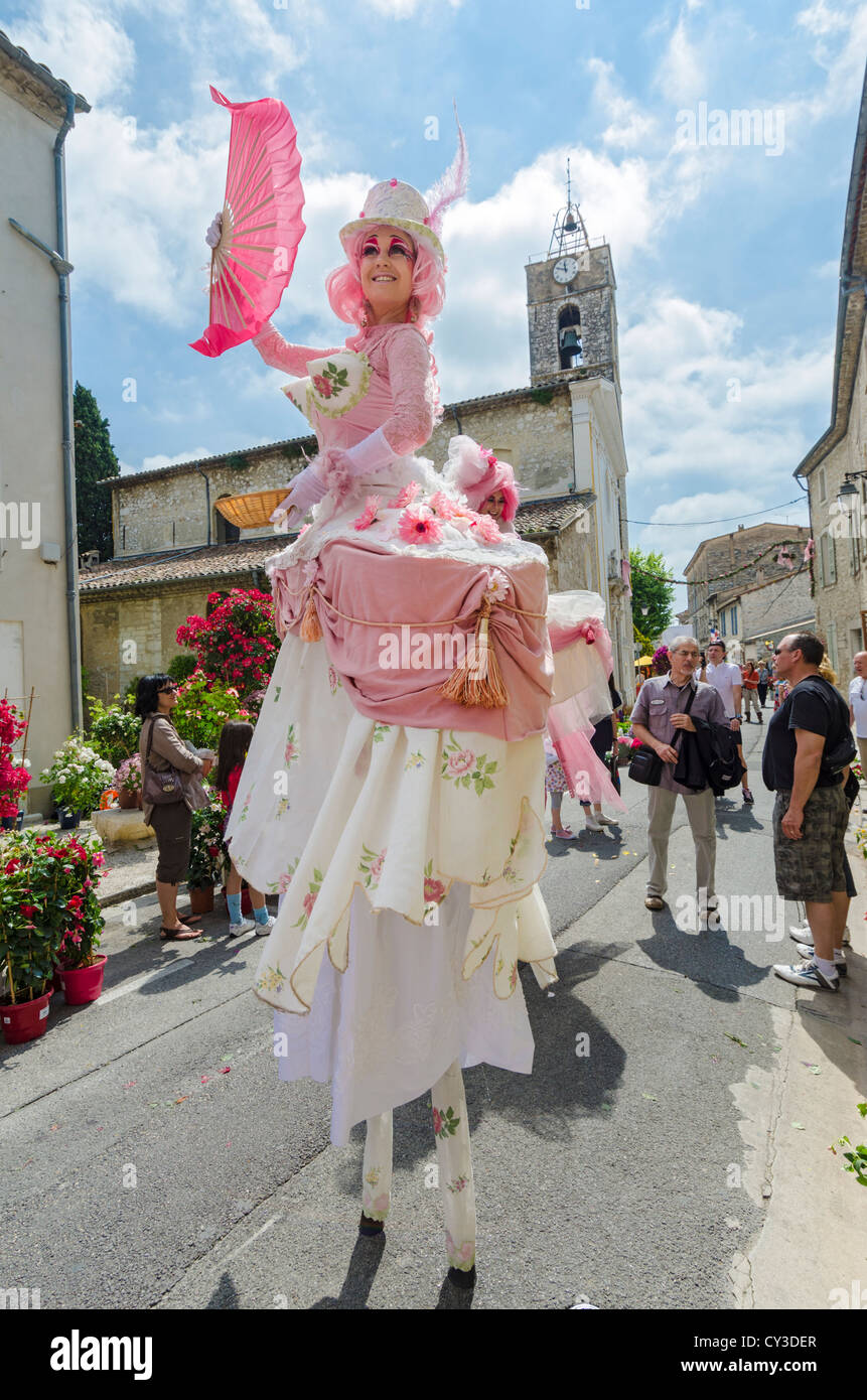 Street performer, stilt walker at the Rose Festival, La Colle sur Loup Stock Photo