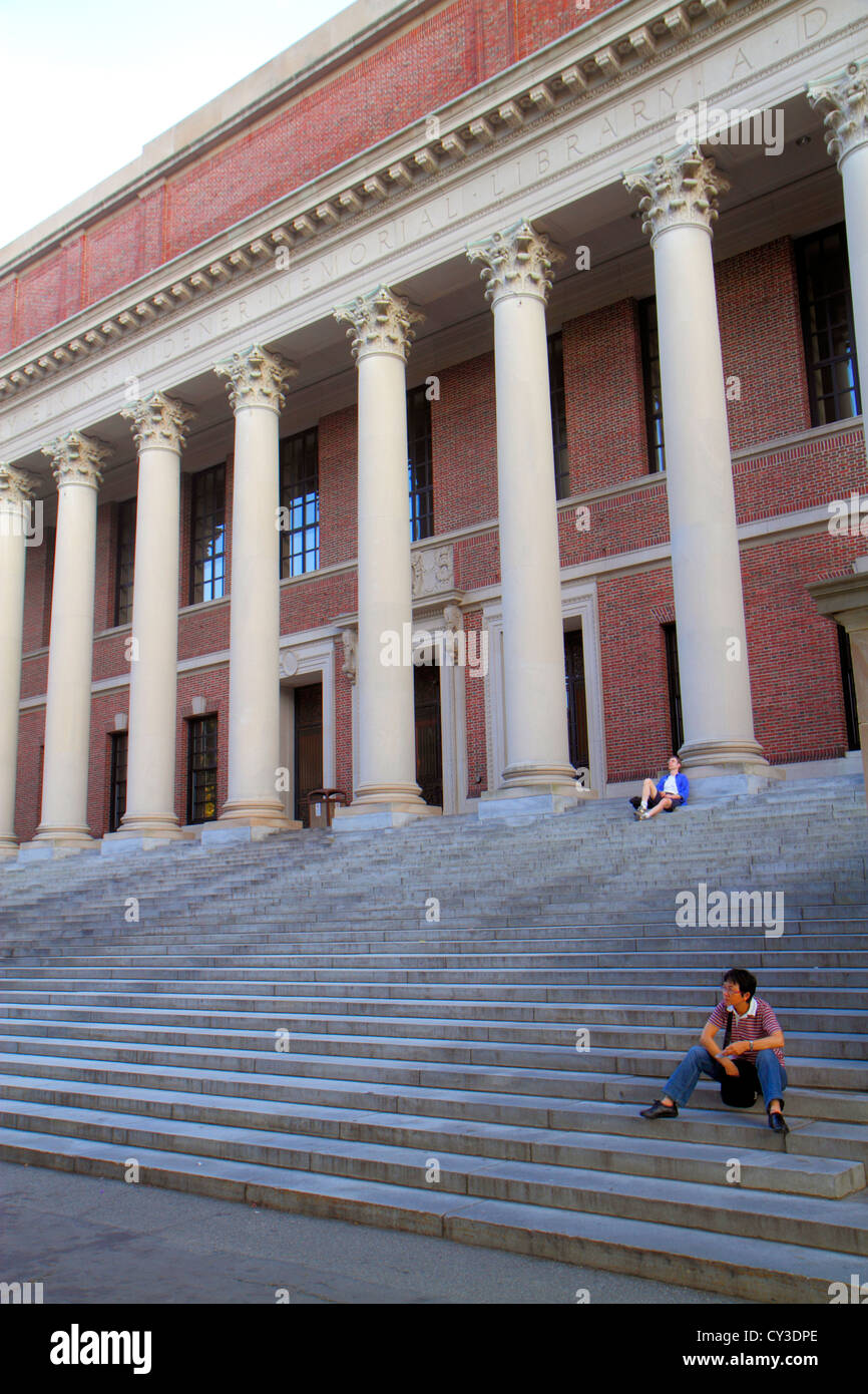 Cambridge Massachusetts,Boston Harvard University,campus,Asian man men male adult adults,student students sitting,Widener Library,steps stairs stairca Stock Photo