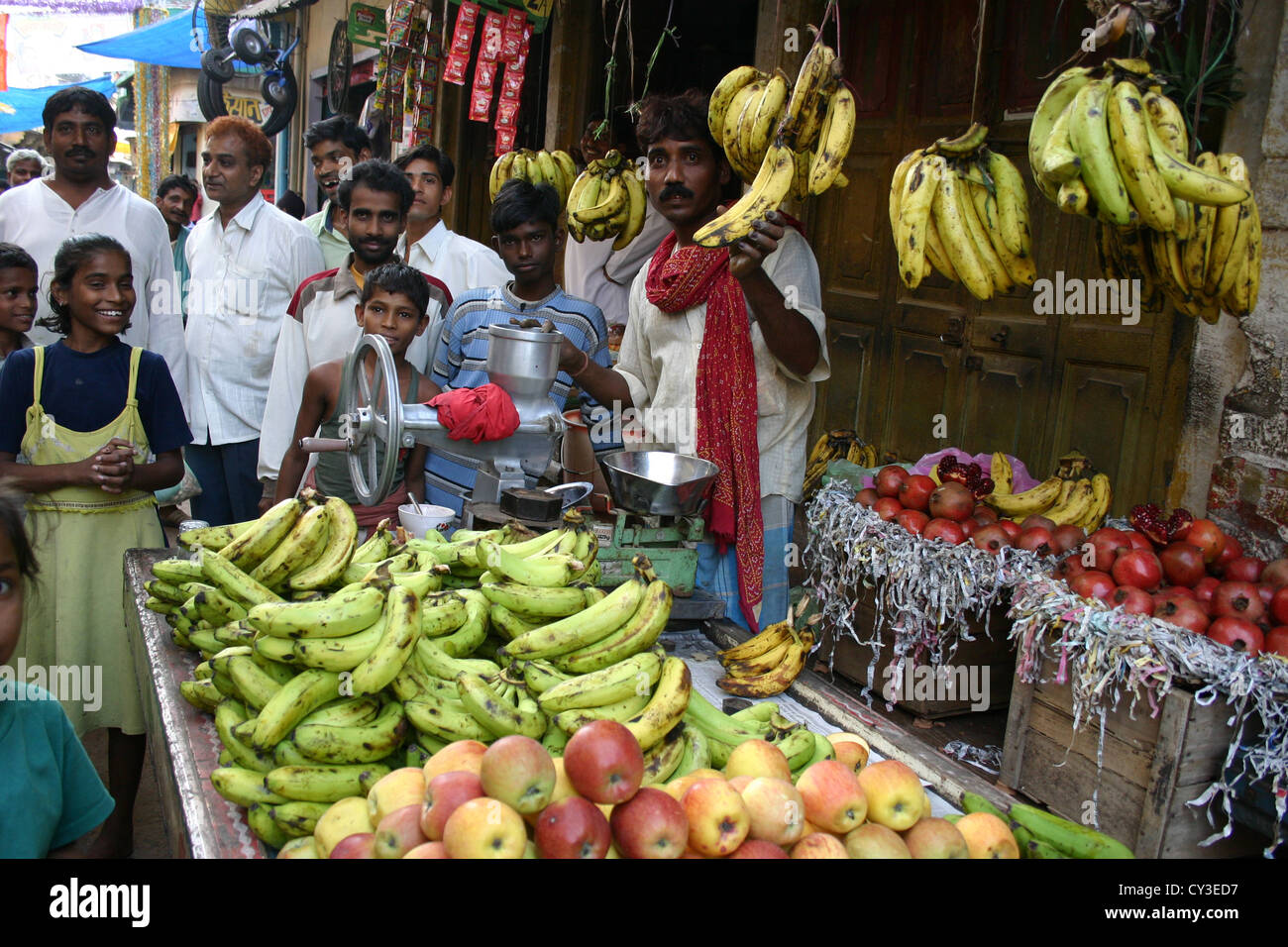 Banana sellers in a street market in New Delhi, India Stock Photo
