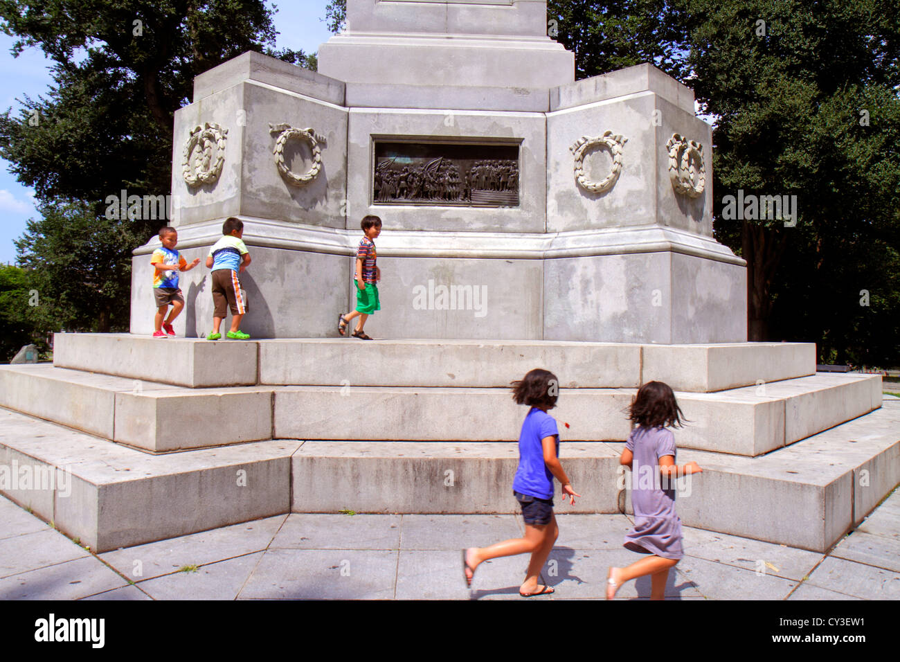 Boston Massachusetts,Boston Common,public park,Soldiers and & Sailors Monument,memorial,Hispanic Latin Latino ethnic immigrant immigrants minority,boy Stock Photo