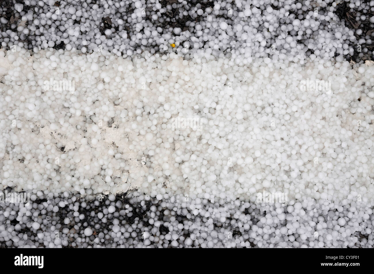 Weather event: hail on the road at the axial zone Stock Photo