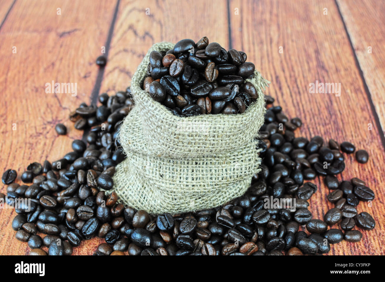 Coffee beans in burlap sack Stock Photo Alamy