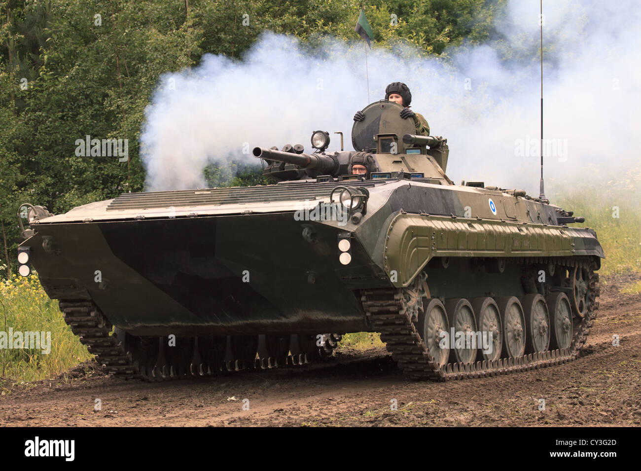 A Finnish Army BMP-2 infantry fighting vehicle revving its engine with a  plume of exhaust smoke Stock Photo - Alamy