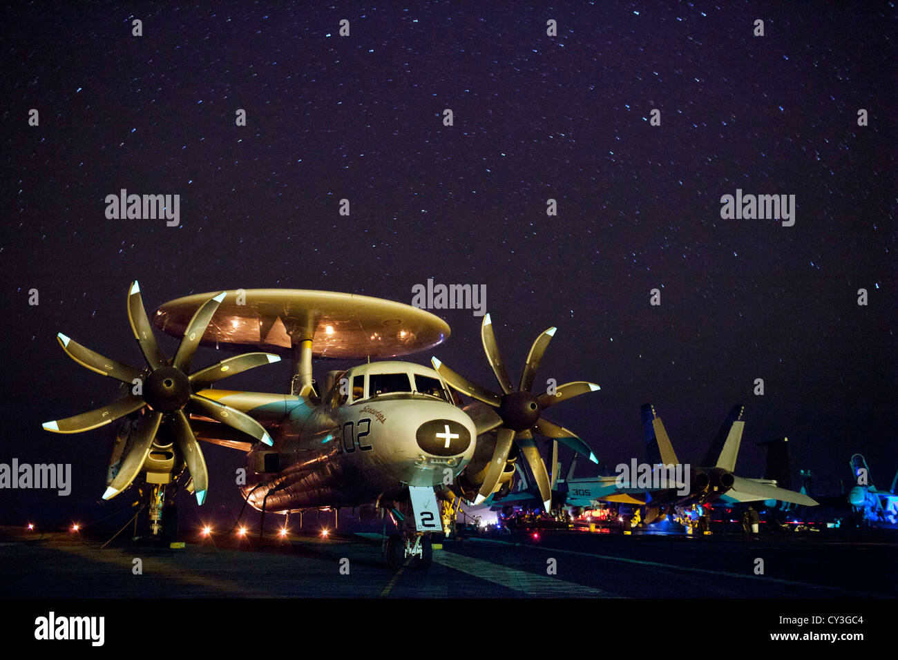Night time view of aircraft sitting on the flight deck of USS Enterprise during routine operations Oct 8, 2012 in the Gulf of Aden. USS Enterprise conducts maritime security operations, theater security cooperation efforts and support missions as a part of Operation Enduring Freedom. Stock Photo
