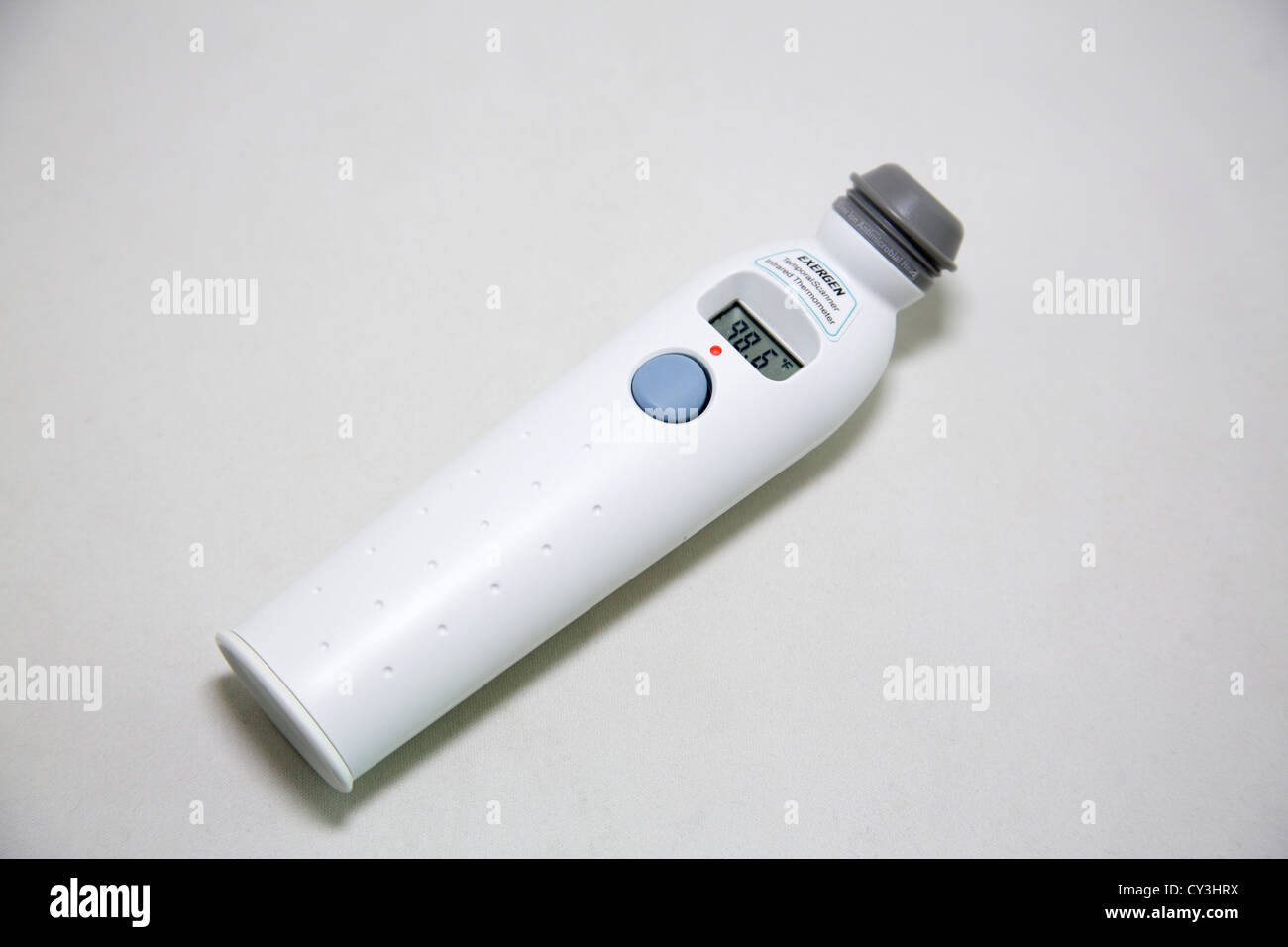 Exergen temporal scanner infrared thermometer displaying 98.6º F Stock  Photo - Alamy