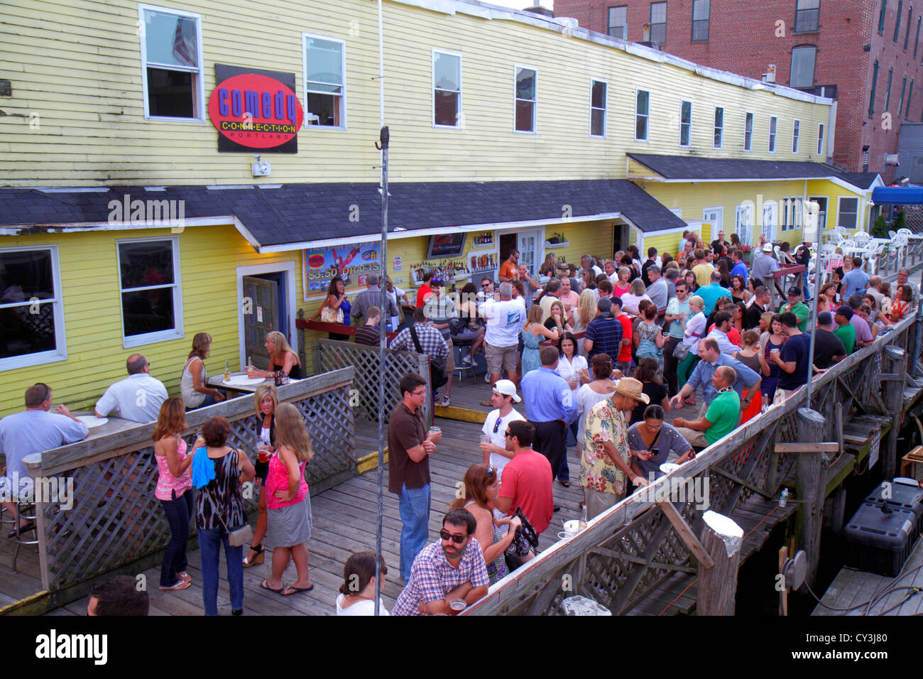 Portland Maine,historic Old Port District,Custom House Wharf,Comedy Connection Cruise passengers,club,party,ME120824025 Stock Photo