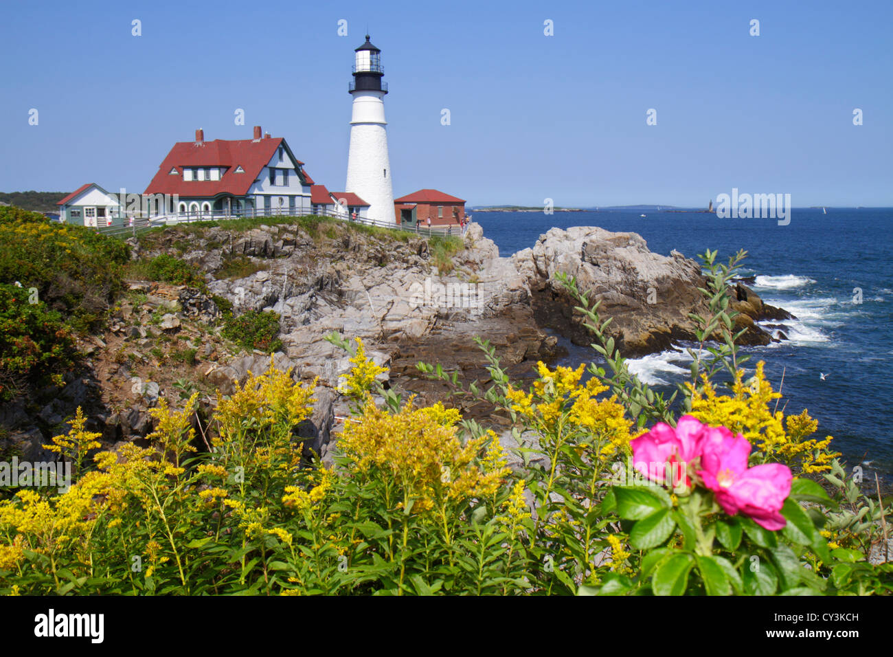 Portland Maine,Cape Elizabeth,Portland Head Light,lighthouse,Keeper's Quarters,Fort Ft. Williams Park,Casco Bay,Atlantic Ocean,water,rocky coast,shore Stock Photo