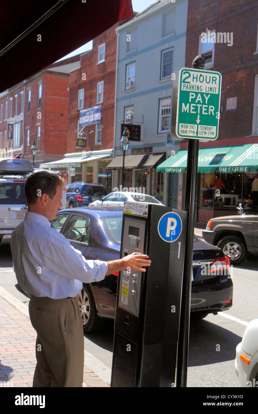 New Hampshire,Portsmouth,Market Street,businesses,district,pay meter,parking,man men male adult adults,using,NH120827007 Stock Photo