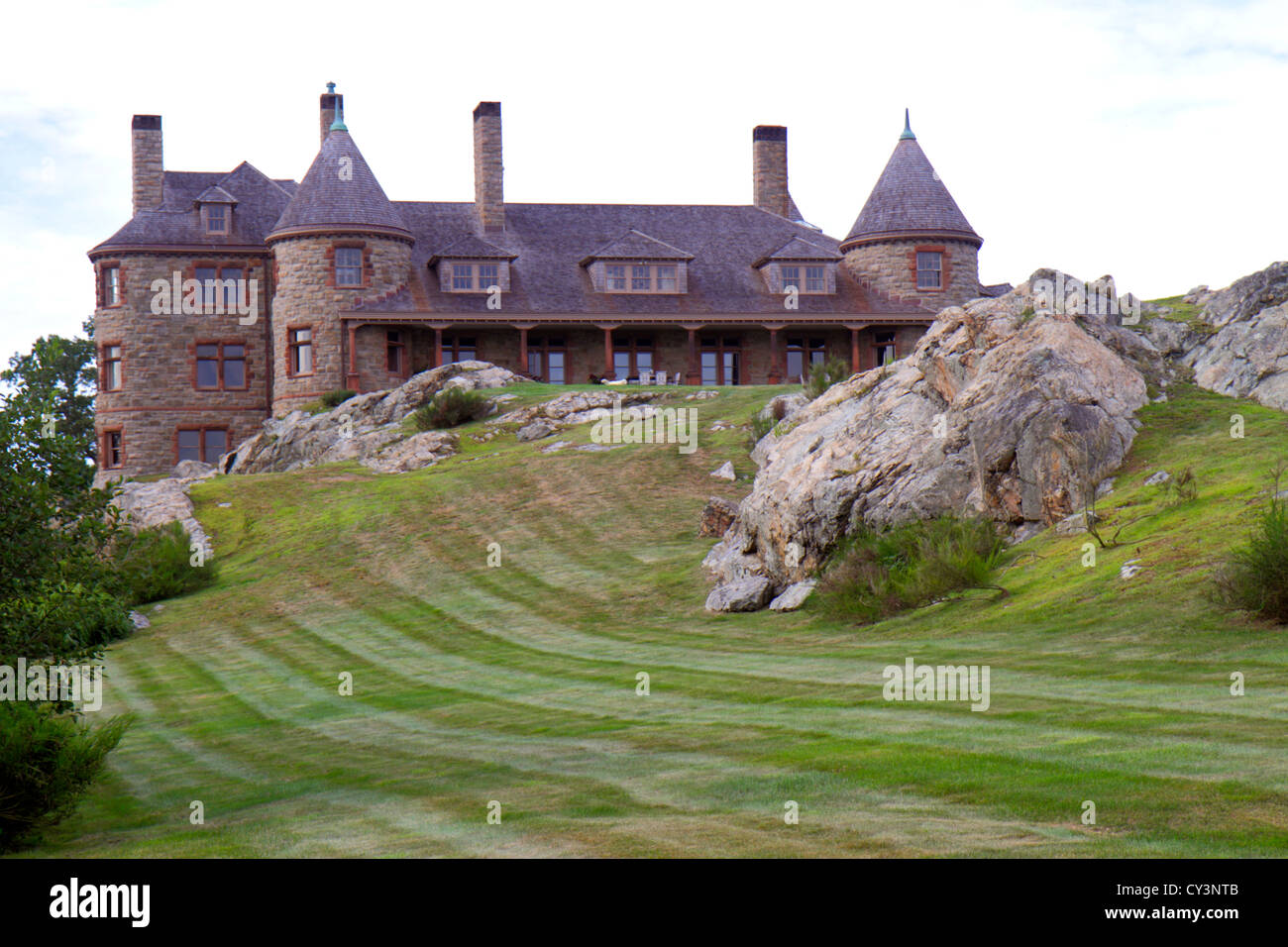 Rhode Island Newport,Ocean Drive,Ten Mile Drive,Ocean Avenue,mansion,home,house home houses homes residence rocks,lawn,mowed,RI120819067 Stock Photo