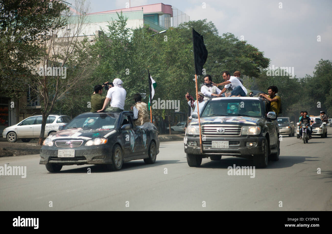 supporters of Ahmed sha masood (Northern alliance) provocing pashtun's and hazara's in the street of kabul Stock Photo