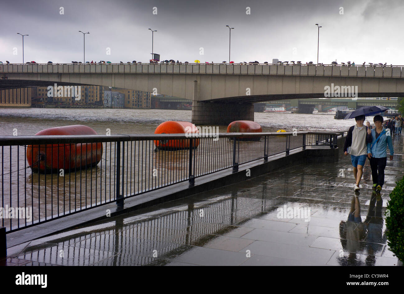 Pedestrians Sheltering High Resolution Stock Photography and Images - Alamy