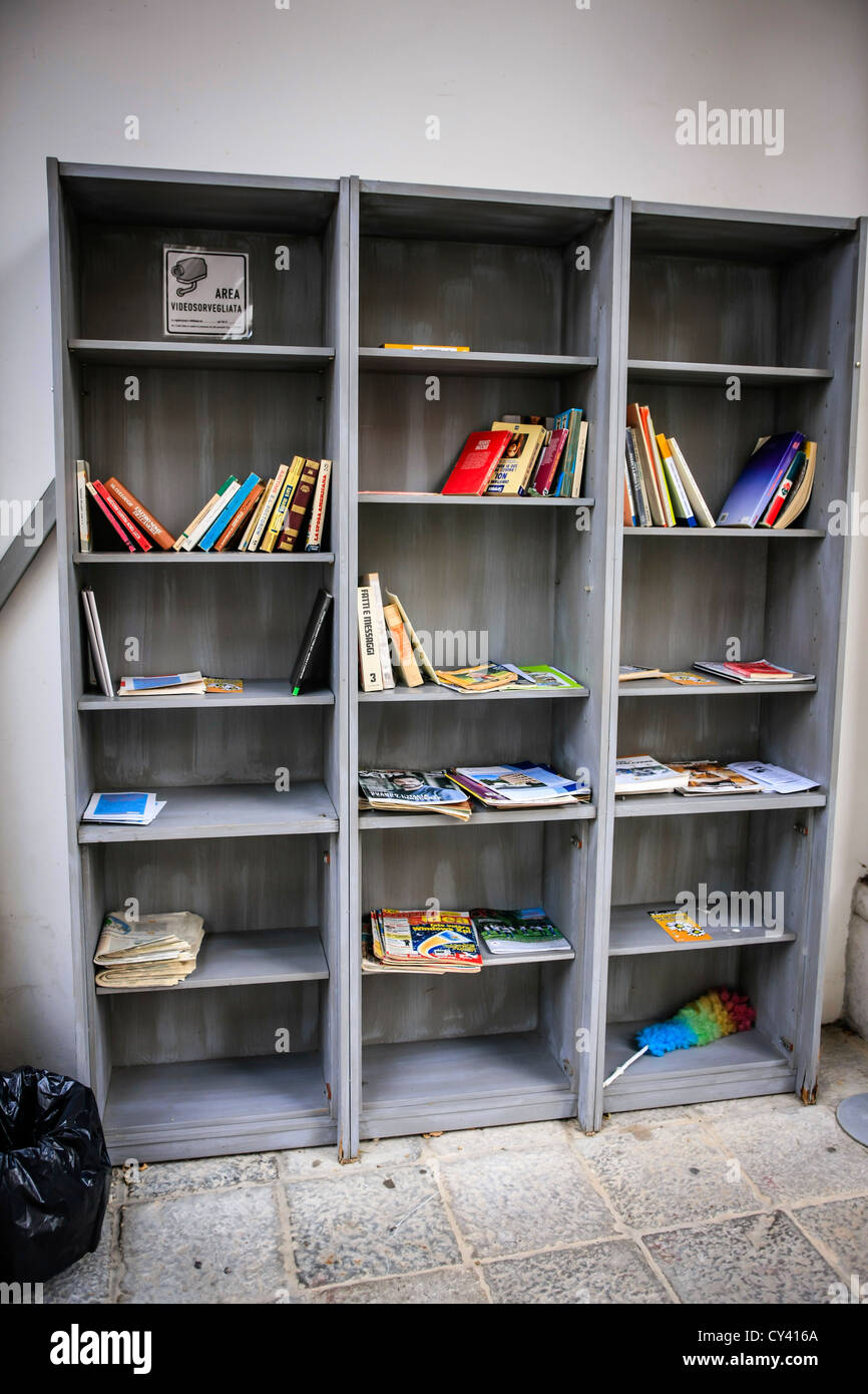 Bookcase of books for an outside public garden in Udine Italy Stock Photo