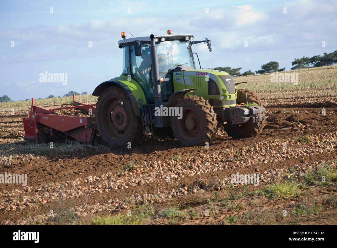 Field tractor harvesting hi-res stock photography and images - Alamy