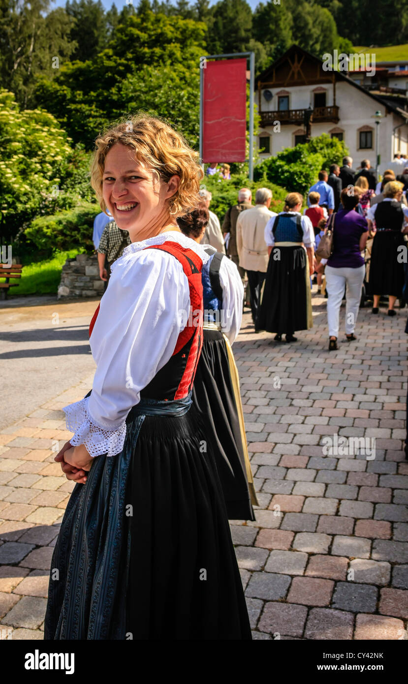 Austrian maiden in her Dirndl in Reithbei Seefeld village on a sunday Stock Photo