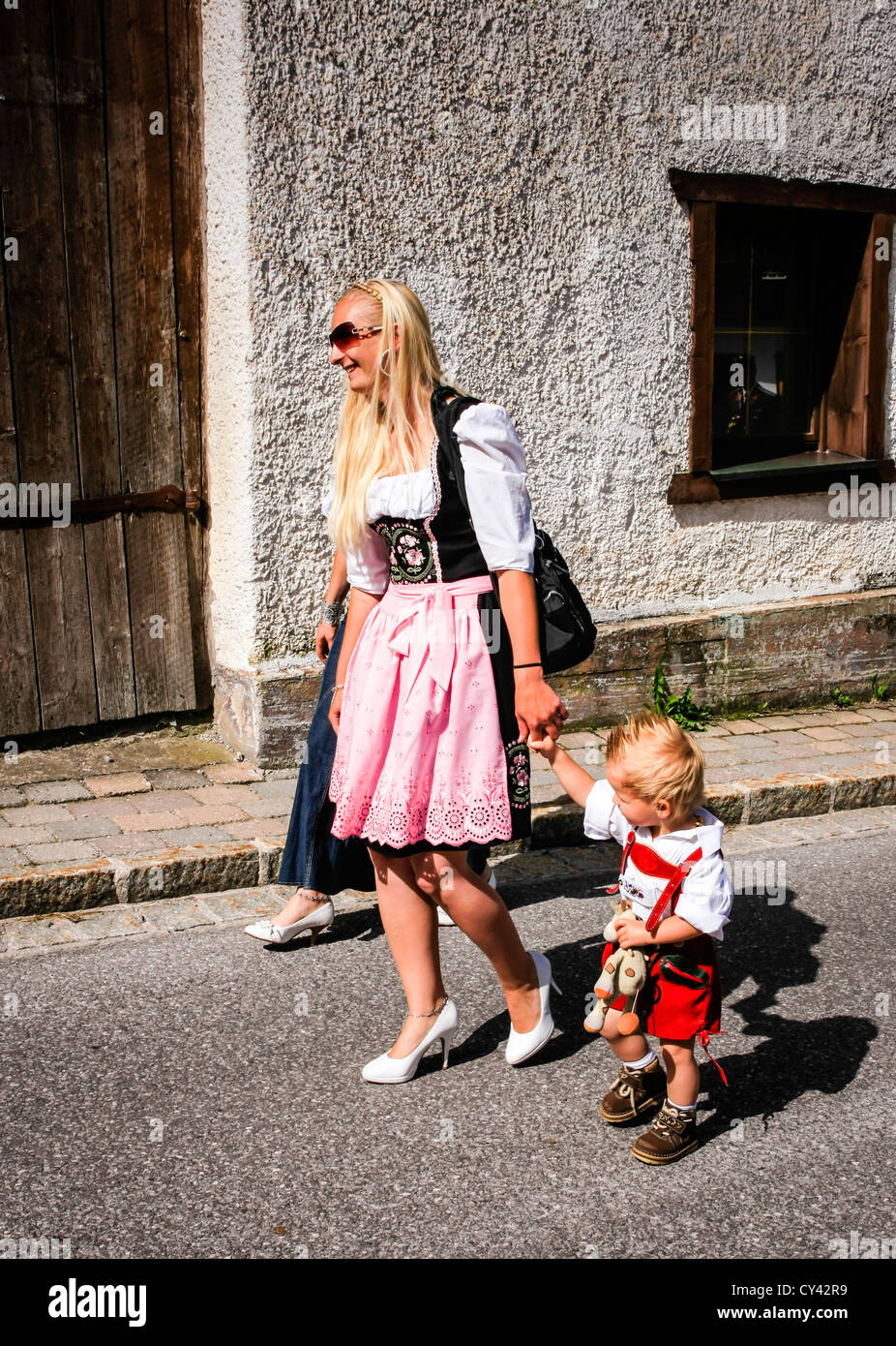 Mother and child in traditional Austrian sunday clothes Stock Photo