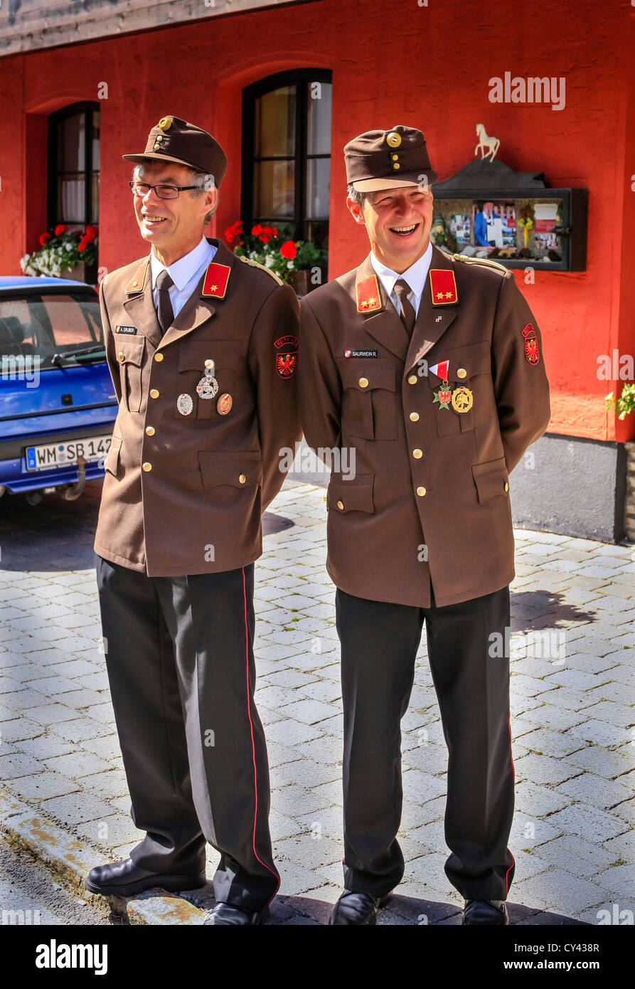 Austrian Firemen in the ceremonial uniforms in Reith bei Seefeld Stock Photo
