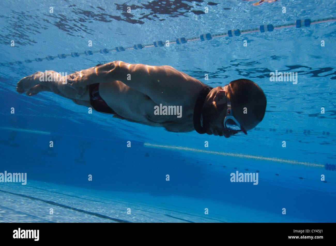 Freediving (or free-diving) is a form of underwater diving that does not involve the use of scuba gear Stock Photo