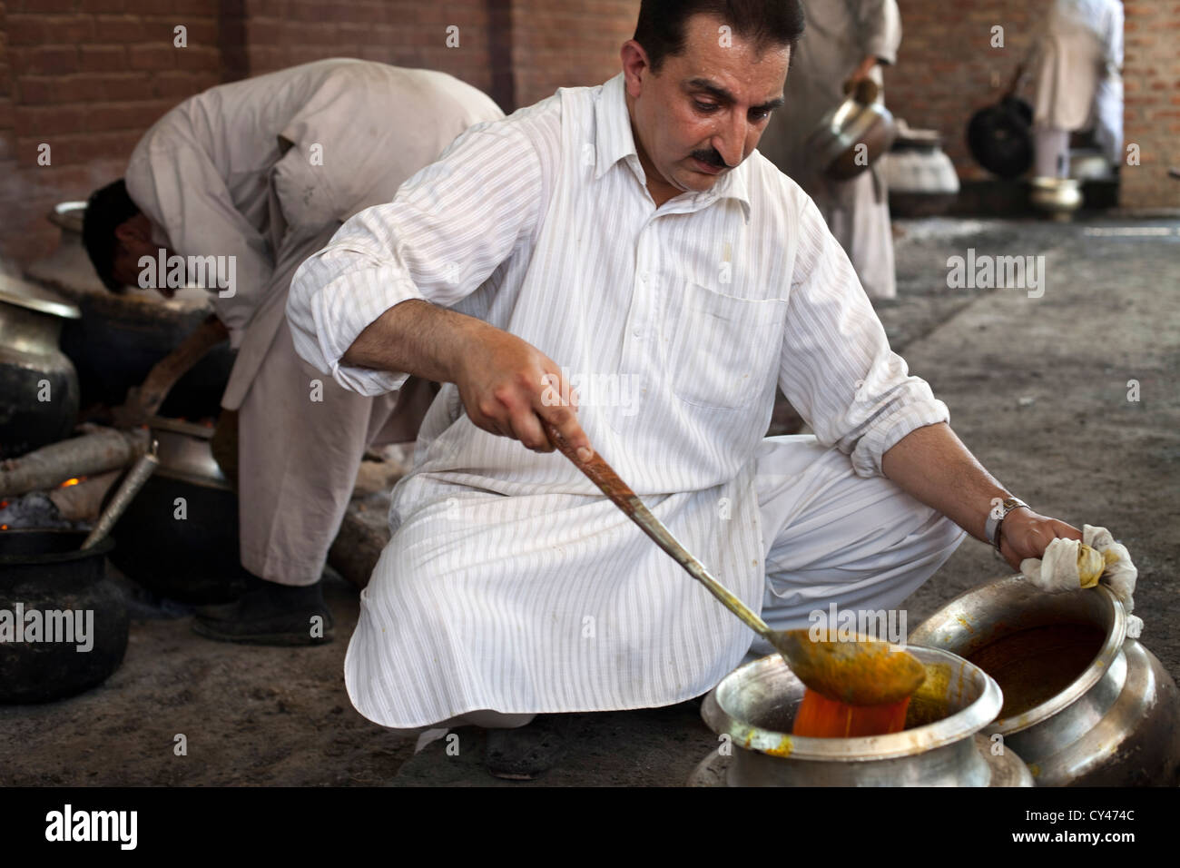 Khan Mohammed Shafi Waza, a traditional Kashmiri chef, cooks Wazwan at