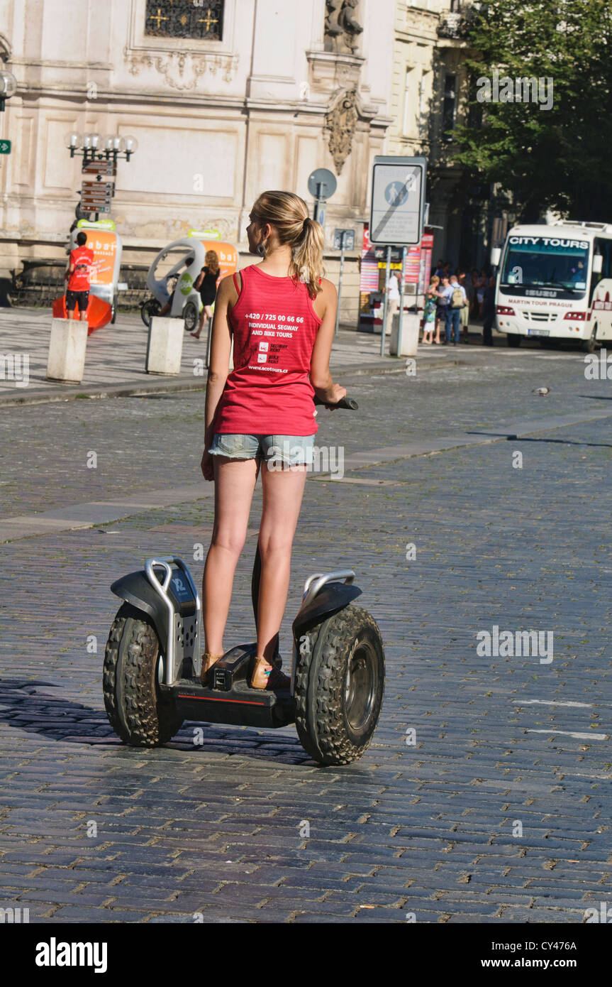 Segway Pretty Pretty girl riding scooter hi-res stock photography and images - Alamy